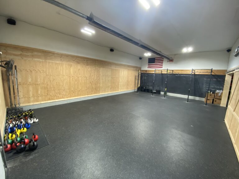 Group Fitness Room with Kettlebells and a rig